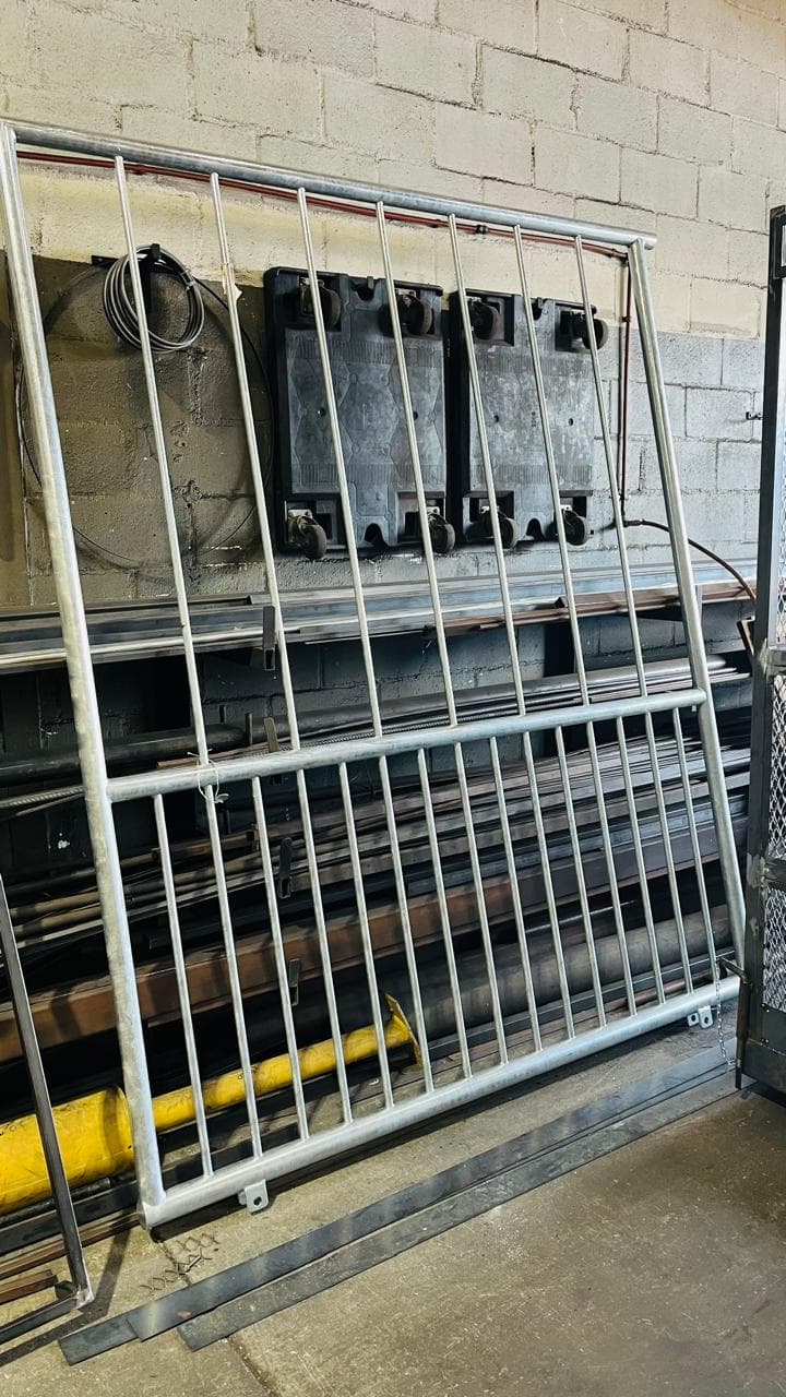 Tubular metal frame with evenly spaced vertical bars